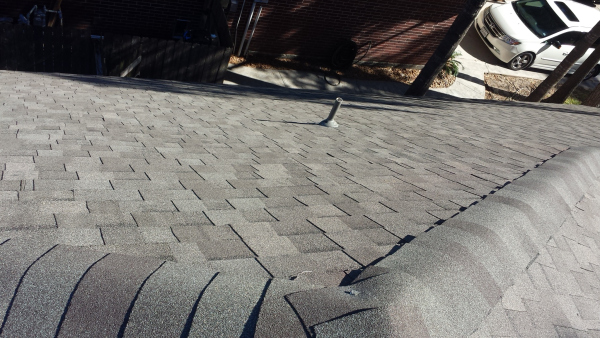Expert roof ridge work demonstrating superior installation techniques and weather protection