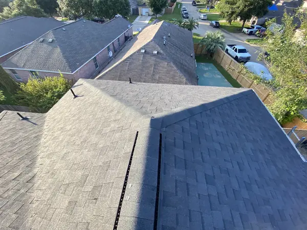 Rear hip slopes after the ridge vent retrofit, Katy 77449