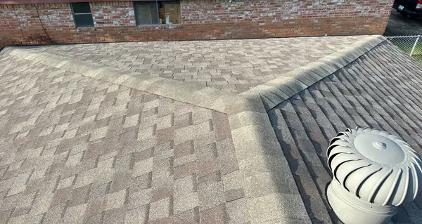 New three-tab shingle roof on a one-story home in Houston 77033