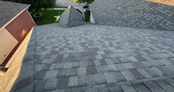 Driftwood laminate roof on a two-story League City home in 77573