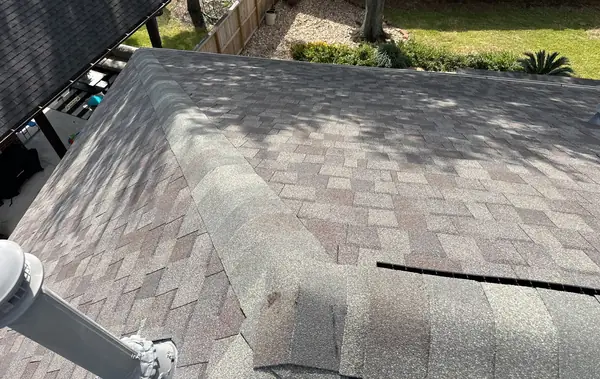 Hip and valley detail on a December roof replacement in Houston