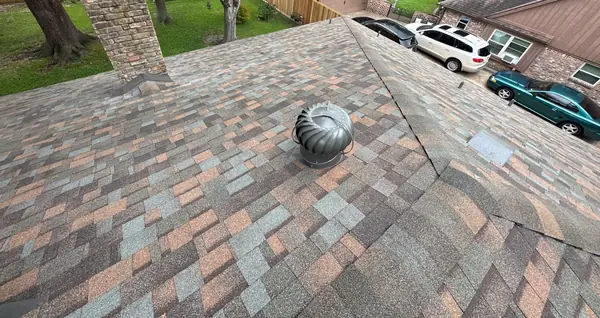 Front slope of a new Aged Copper roof in Missouri City, TX