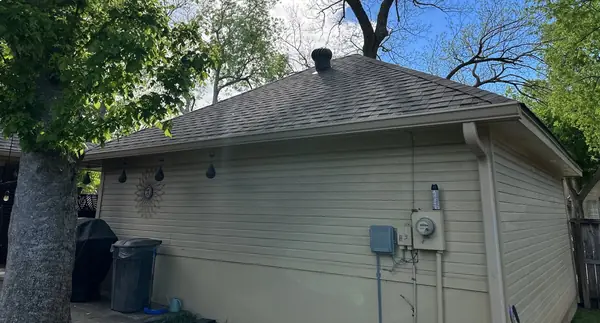 Garage side of a replaced roof in Sugar Land 77479