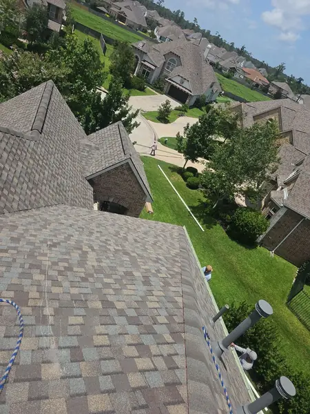 Rooftop view over the completed hips and the neighborhood beyond, Tomball 77375
