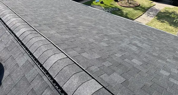 Hip ridge of a June 2025 roof replacement in west Houston