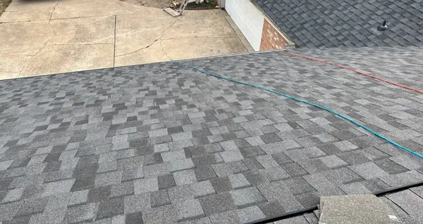 Fresh laminate shingles on a low-slope roof in Houston, TX