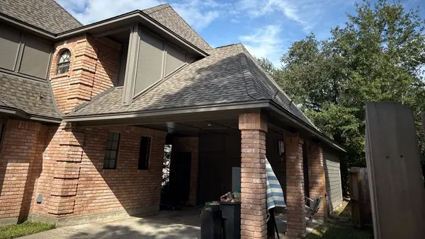 Carport roof tied into the main hip