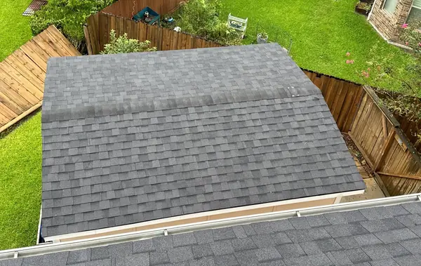 Brick chimney re-flashed on a new League City, TX roof