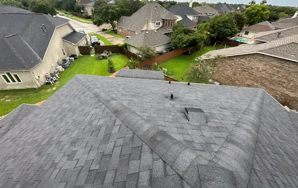 Ridge cap and valley detail on a new League City roof