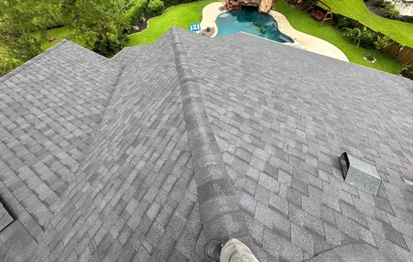 Charcoal laminate roof on a two-story League City home in 77573