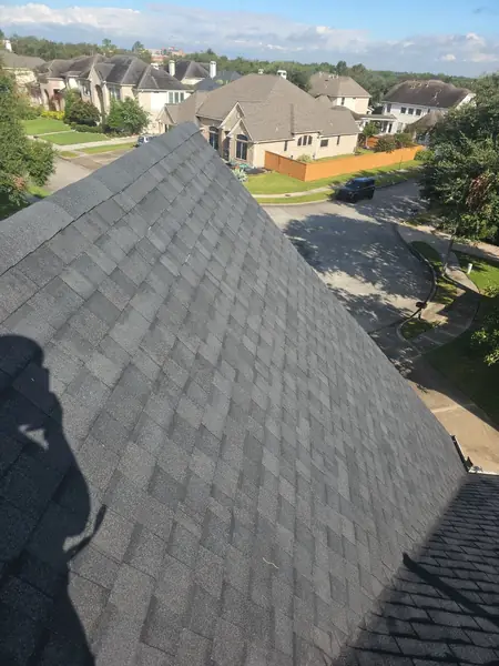 Driftwood laminate roof on a two-story League City home in 77573