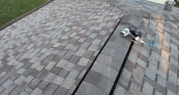 Hip ridge of a June 2024 roof replacement in Channelview