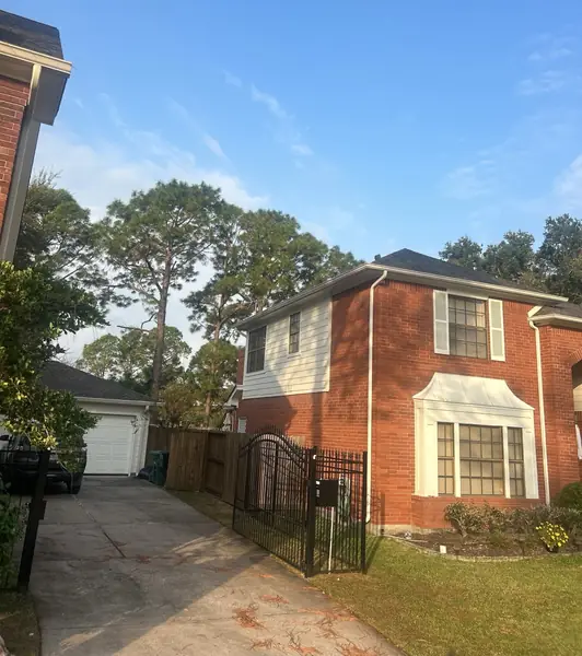 Two-story Clear Lake home in Houston 77062 with a new weathered-gray roof