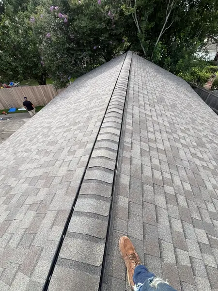 Brick chimney re-flashed on a new Houston roof
