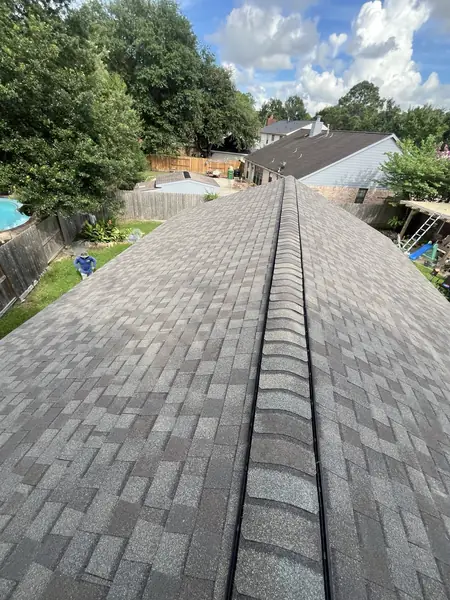Charcoal laminate roof on a two-story Clear Lake home in Houston 77062