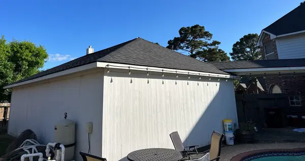 Detached garage re-roofed to match the house