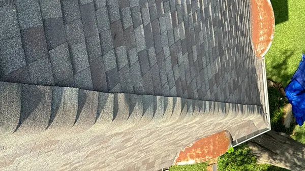 Hip ridge of an August 2024 roof replacement in west Houston
