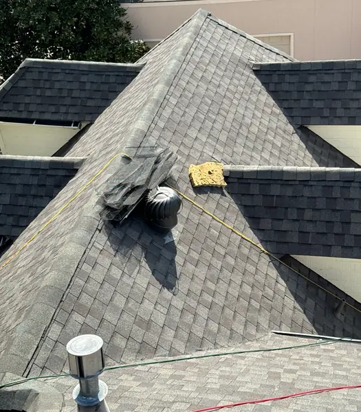 Charcoal laminate roof on a two-story Memorial-area Houston home in 77079