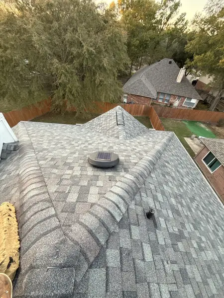 Ridge of a new Colonial Slate roof in Cypress seen from above