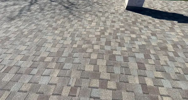 Close view of the tan-and-brown shingle blend