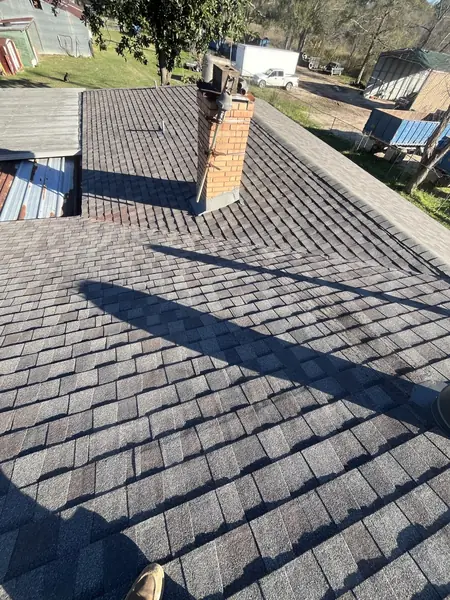 Brick chimney re-flashed on a new Houston roof