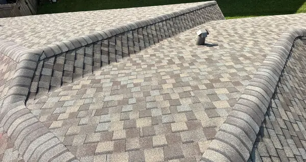Rear slope with new ridge vent under the caps