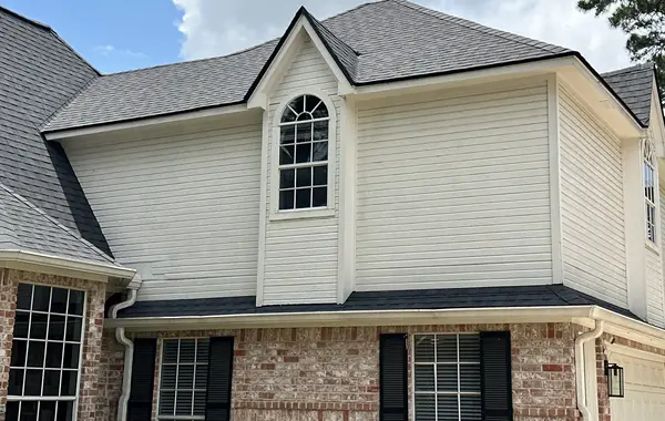 Close view of the front dormer and gable after shingle replacement