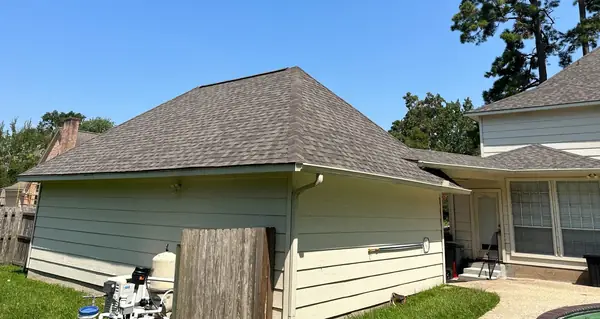 Pool house re-roofed to match the house