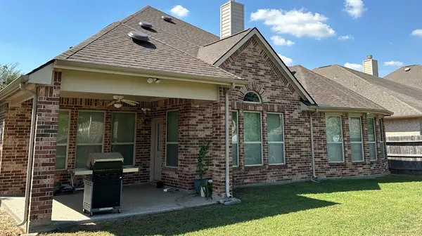Rear elevation with covered patio after replacement