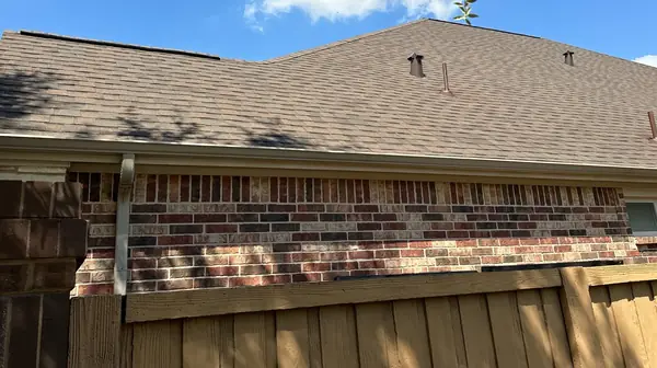 Roofline and eave with new drip edge