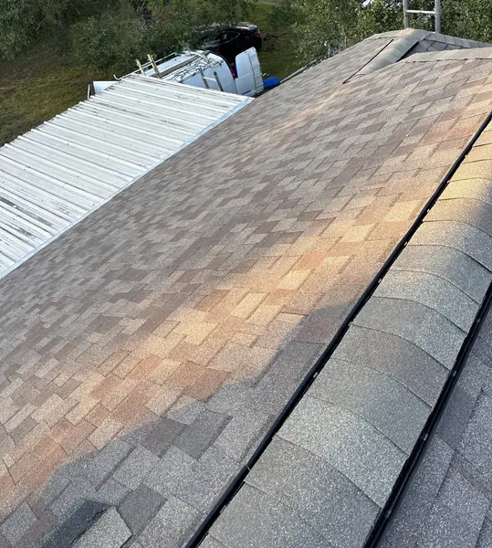 Ridge of a windstorm-certified roof replacement in Manvel, TX