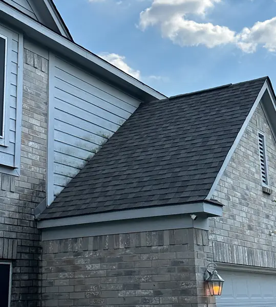 Hip ridge of a March 2026 roof replacement in Houston