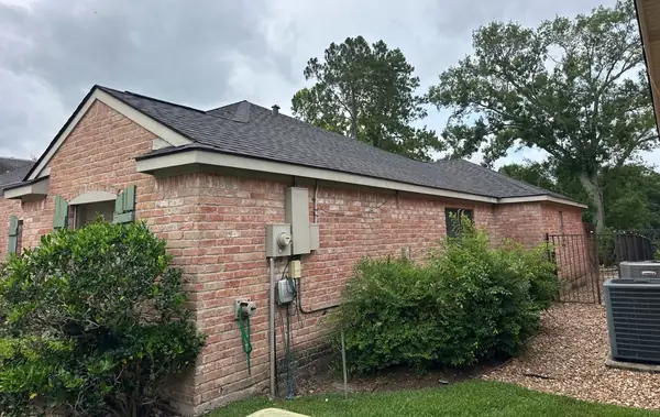 Hip ridge with new ridge vent on a Missouri City, TX roof