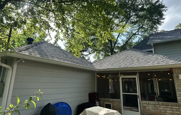 Back of the house showing the patio roof tying into the main slope