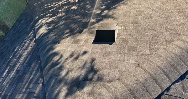 Ridge vent on a new black shingle roof in Houston