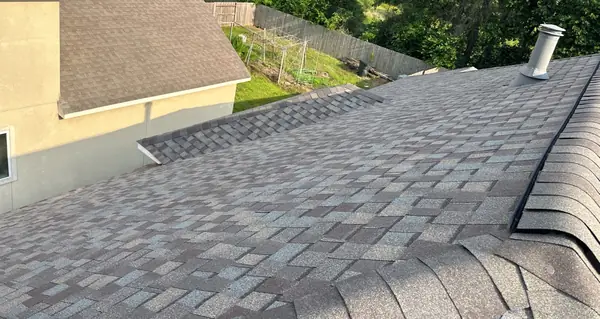Shingle field and hip caps after replacement, Humble 77396