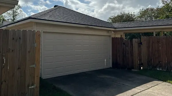 Detached garage roof replaced on a Houston property in 77065