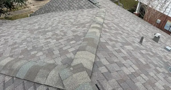 High-profile ridge cap on a new laminate roof in Aliana, Richmond 77407