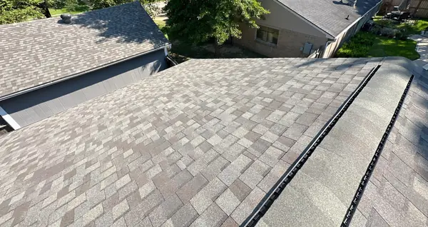 New Weathered Wood roof with ridge vent on a Copperfield home in Houston 77095