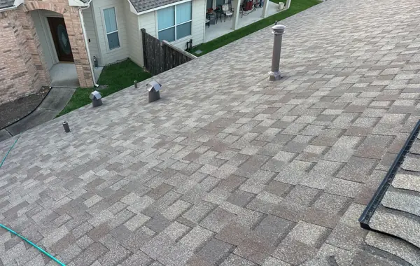 Brick chimney re-flashed on a new Pearland roof
