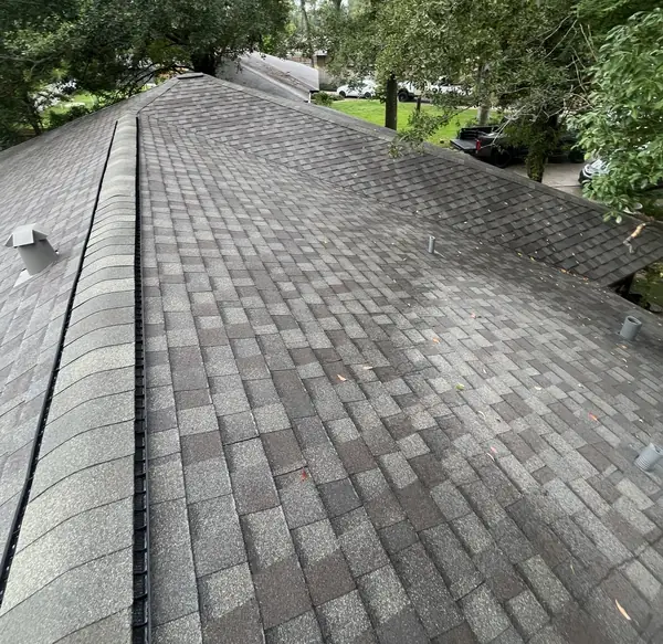 Driftwood laminate roof on a one-story Spring Branch home in Houston 77080