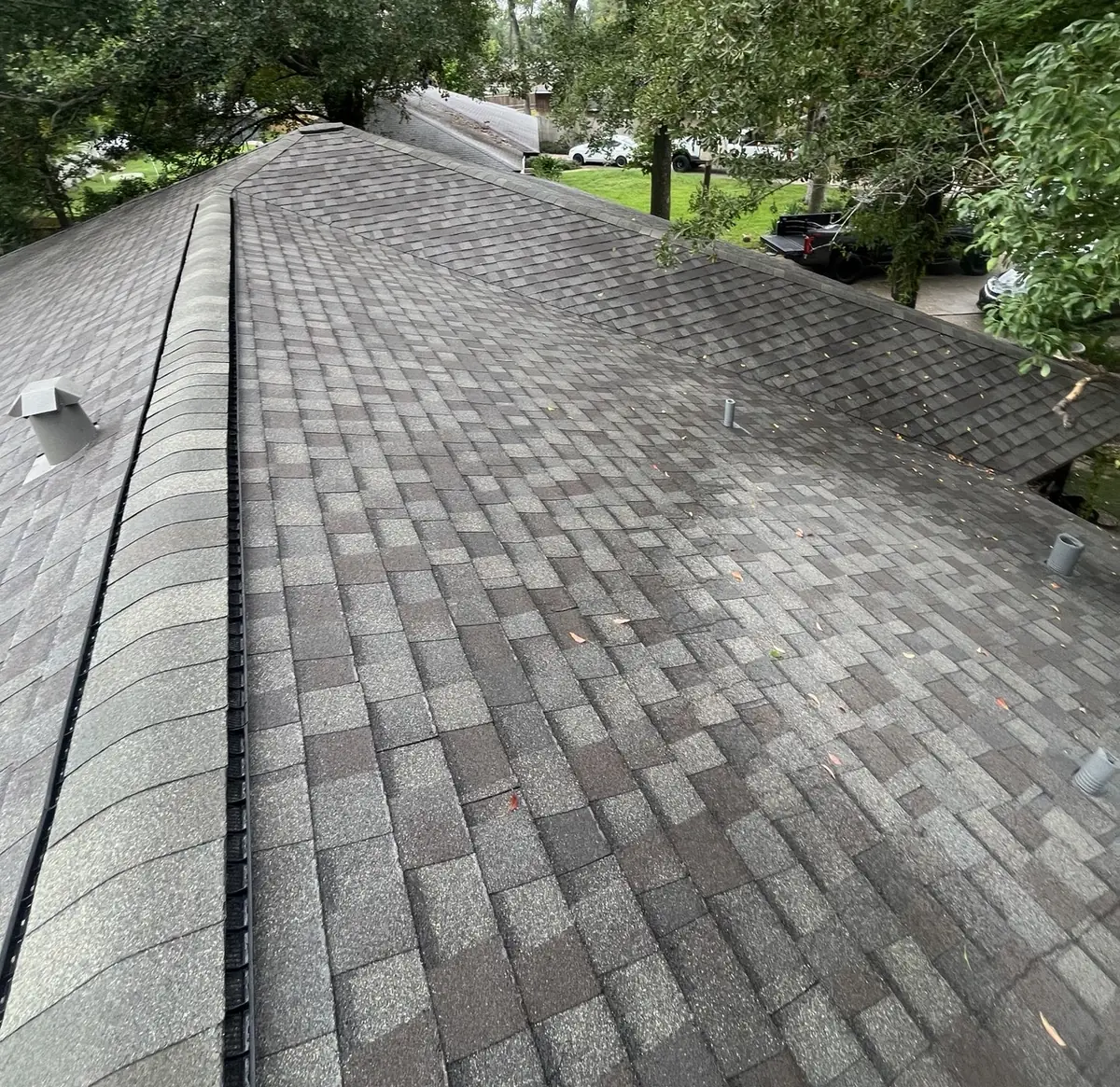 Driftwood laminate roof on a one-story Spring Branch home in Houston 77080