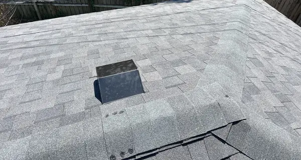 Front of a two-story Memorial home with a new roof