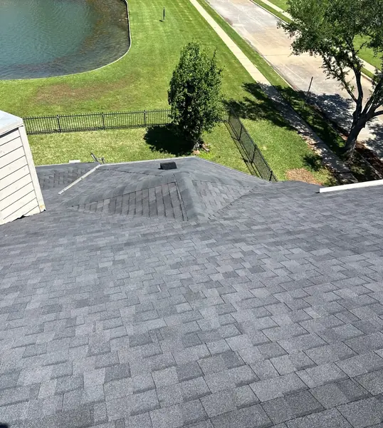 Garage wall tie re-flashed on a Houston roof