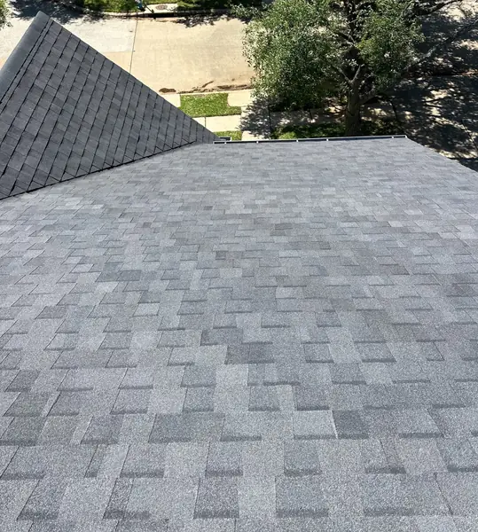 Ridge cap and valley on a new laminate roof in Copperfield