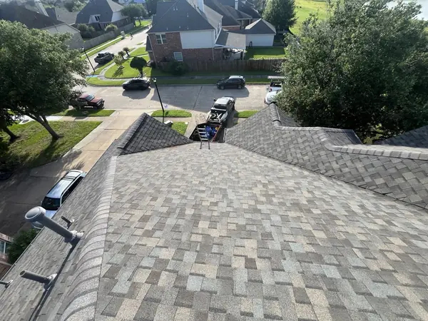 Weathered Wood shingle roof looking down the main hip toward the street