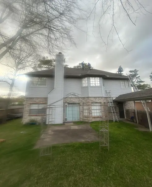 Two-story Clear Lake home in Houston 77062 after a one-day roof replacement