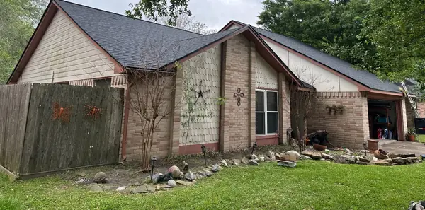 Rear of a League City home after a June 2024 roof replacement