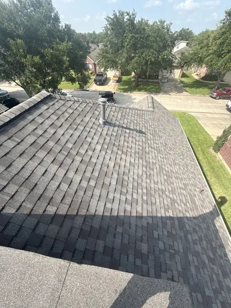 Chimney counter flashing on a new Pearland roof