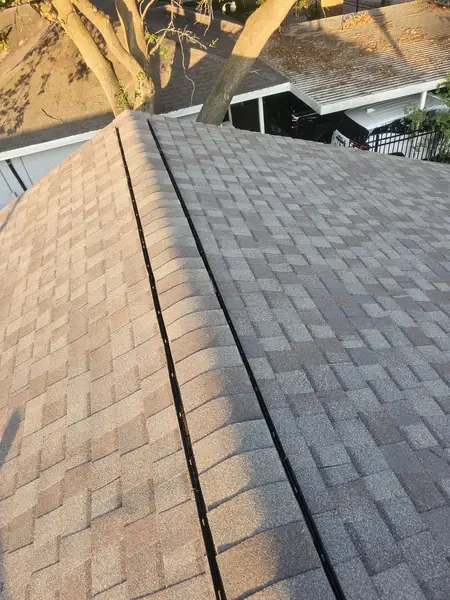 Driftwood laminate roof on a one-story Northside Houston home in 77022
